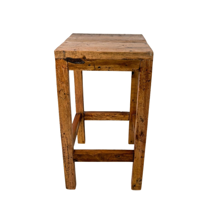 Front view of Armazi Bar Stool made from reclaimed teak wood with a square, rustic design.