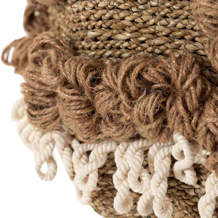 Close-up texture of the brown jute-like fibers on the Aroni Stool.