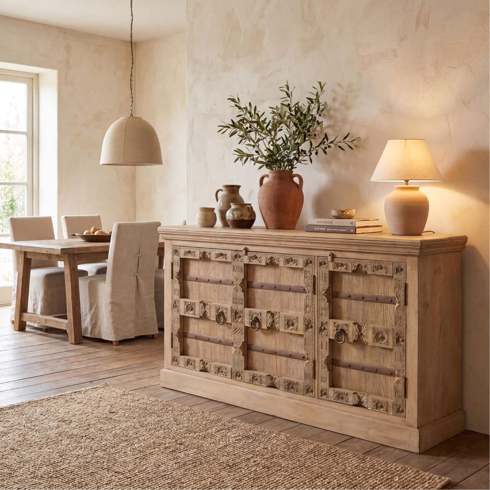 Styled interior setting featuring the Aruna buffet in a warm dining space with natural decor.