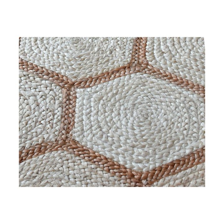 Close-up of Ashwen Rug hexagonal weave in Ivory/Brown
