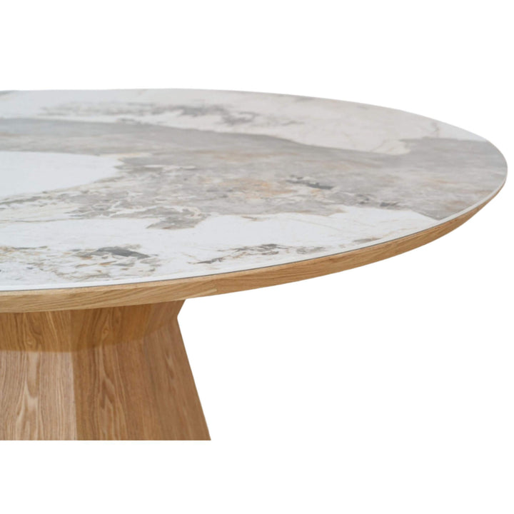 Close-up of the ceramic tabletop with natural stone-effect pattern on the Ash & Ceramic Dining Table.
