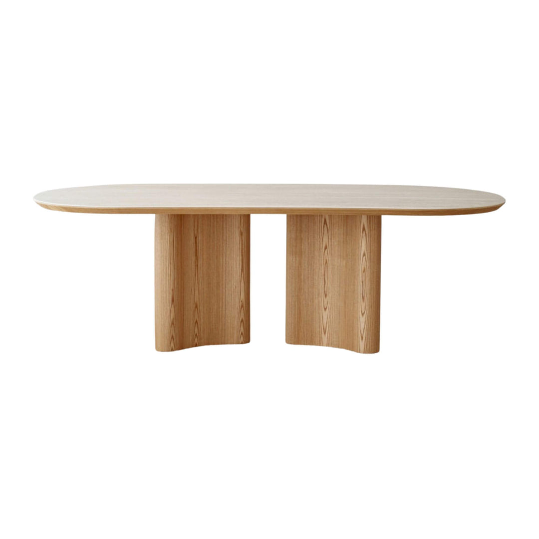 Ash oval dining table with ceramic top, front view.
