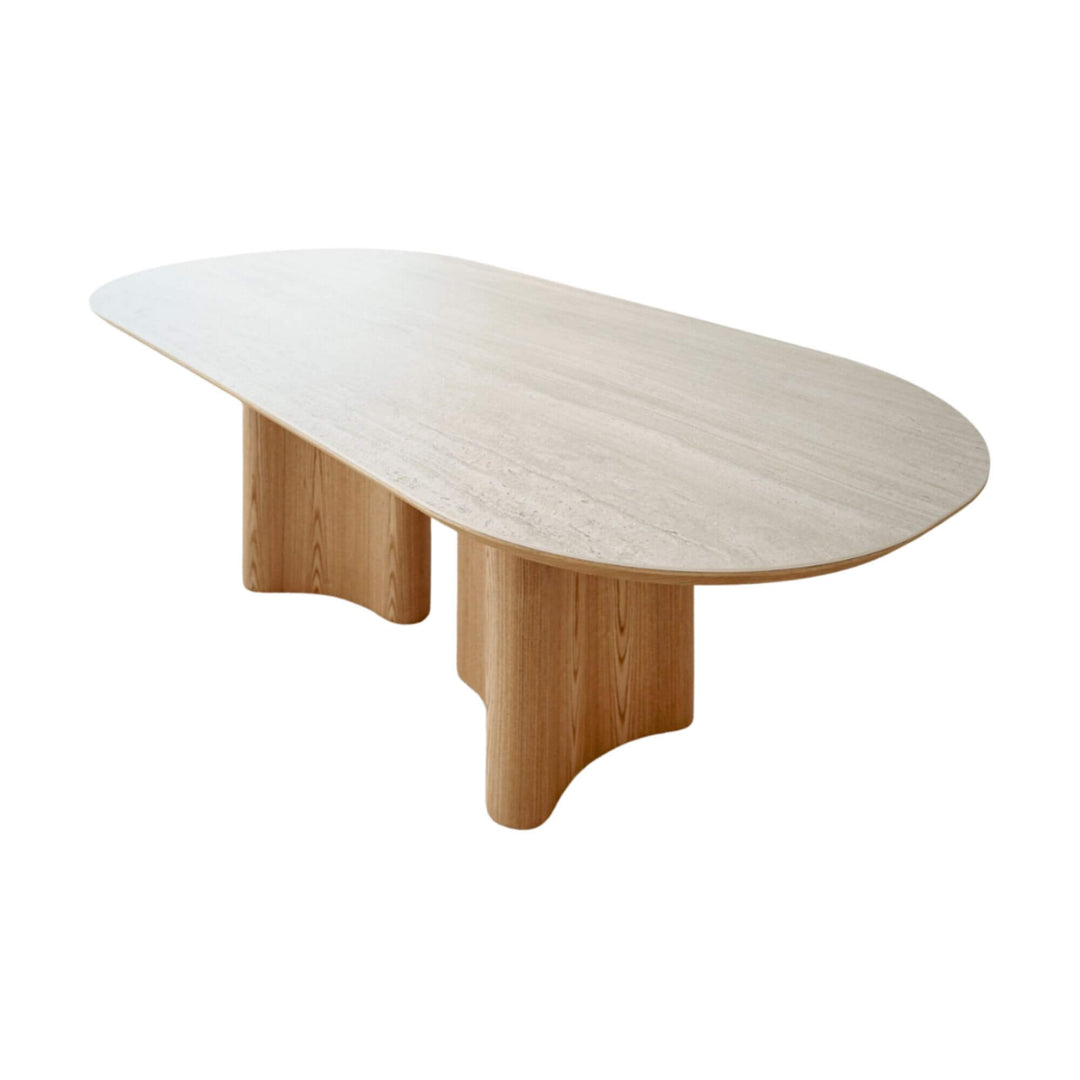 Side angle of the ash and ceramic oval dining table.