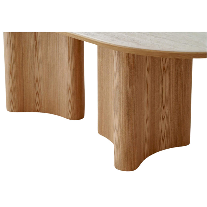 Ceramic tabletop detail of the ash oval dining table.