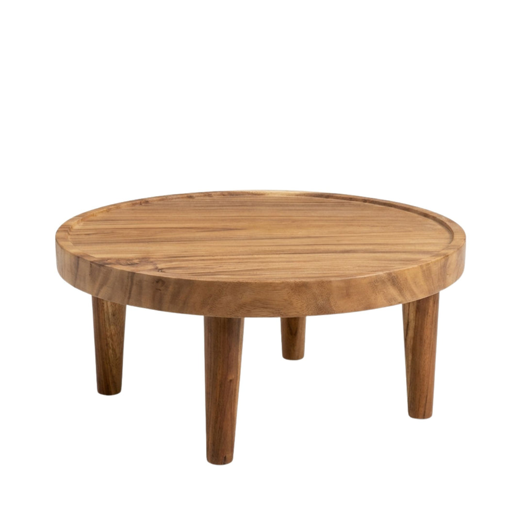 Front view of Large Asterope Suar Wood Coffee Table showing its round silhouette and solid legs.