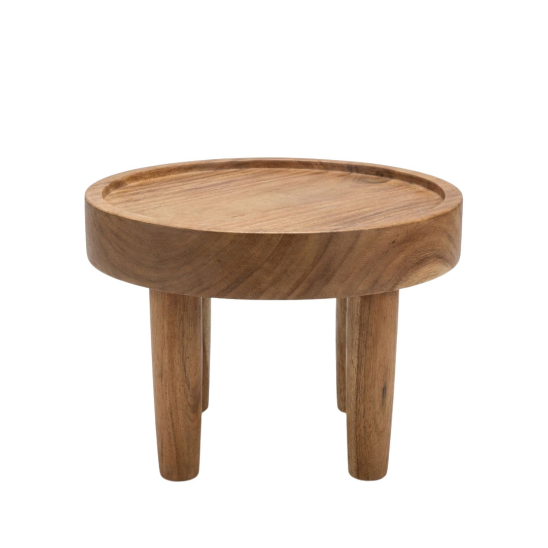 Side view of small Asterope Suar Wood Coffee Table highlighting the thickness of the tabletop.