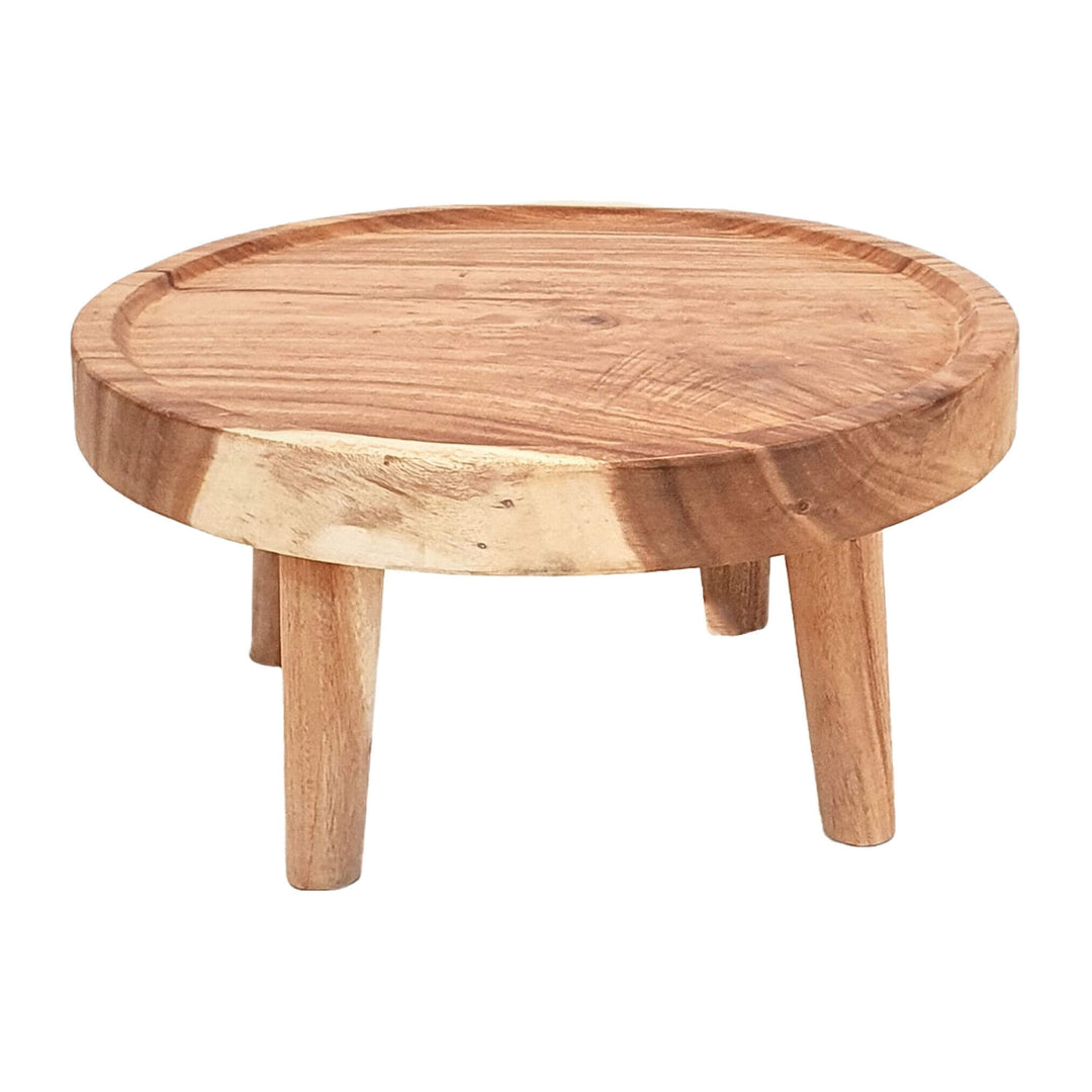 Front view of round suar wood coffee table with  legs