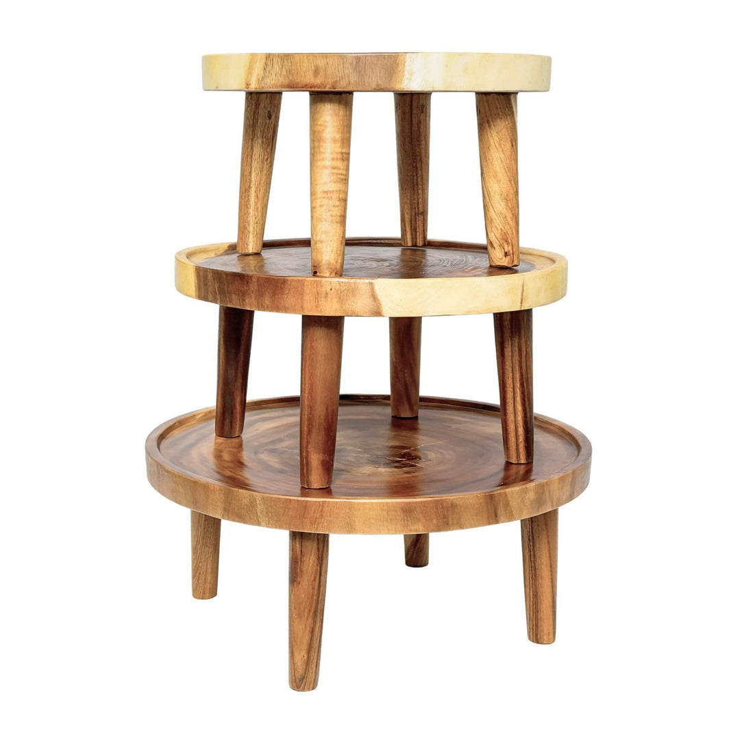 Tiered display of suar round tables showing different heights