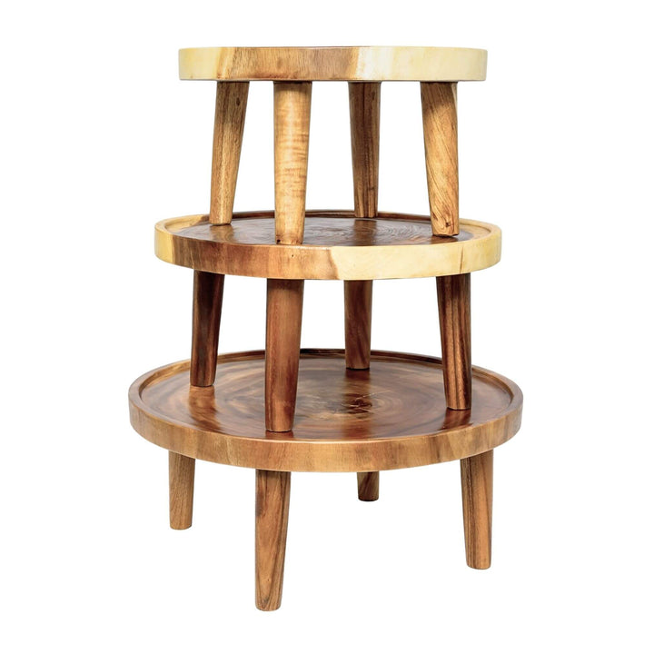 Tiered display of suar round tables showing different heights