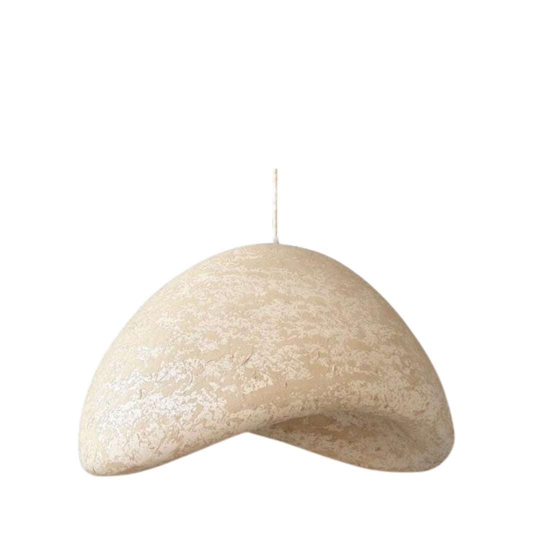 Front view of the Aster pendant lamp showing its organic sculptural shape and textured finish.