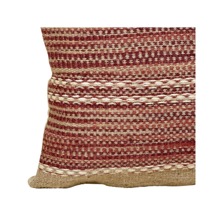 Close-up of Aura Jute Cushion in terracotta and natural beige jute showing detailed woven stripes.