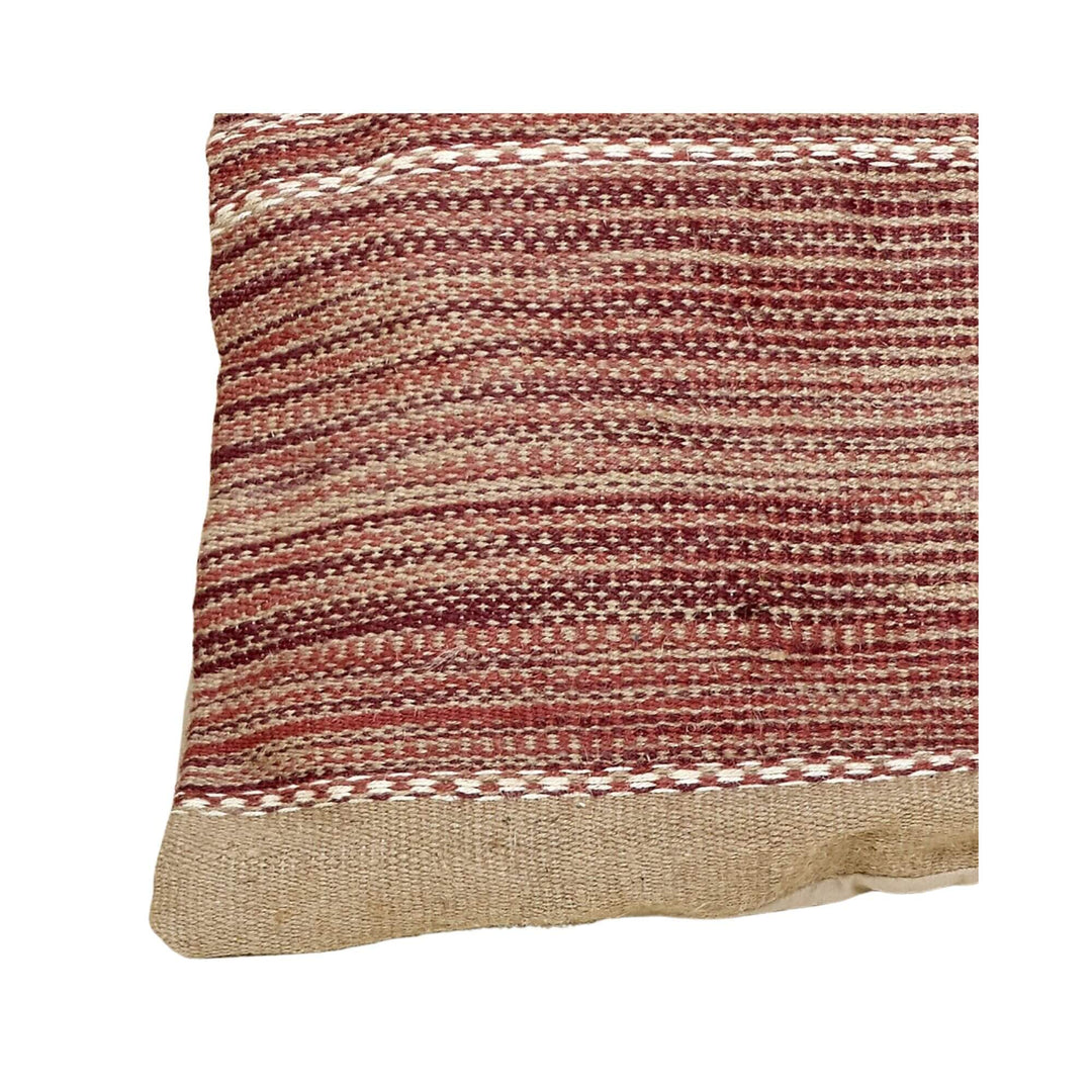 Close-up of red woven jute texture on large square cushion
