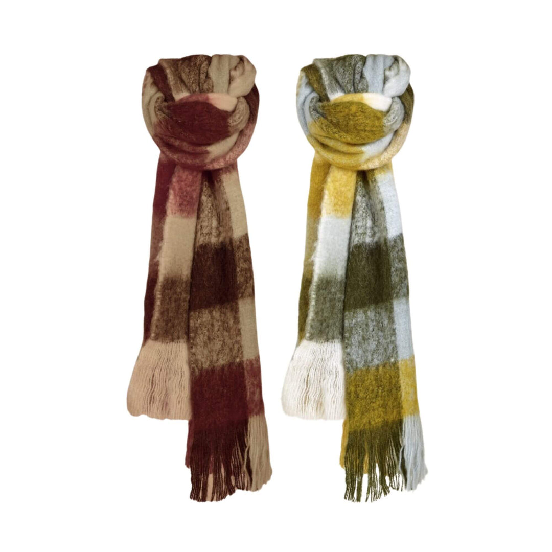 Aura scarf pair in warm terracotta and cool mustard-green checks hanging together

