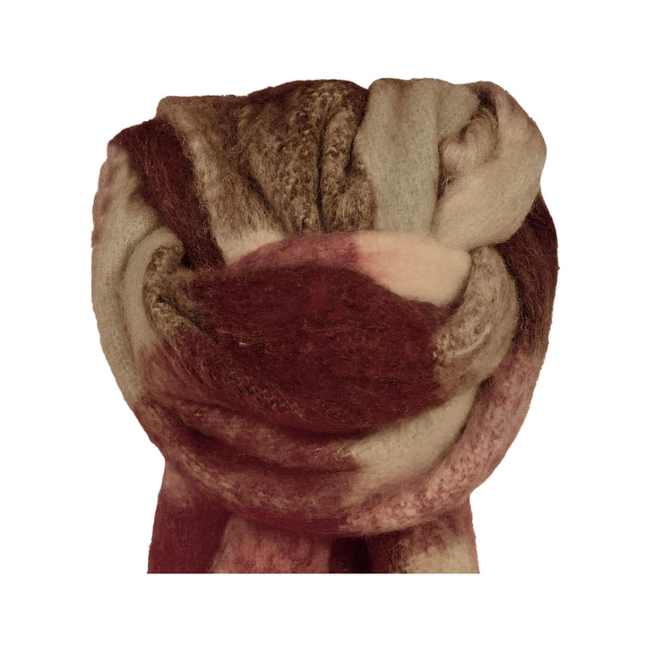 Close-up of warm Aura scarf knot in garnet, brown and beige checks
