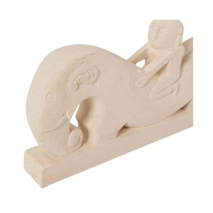 Elephant head carving detail in stone sculpture