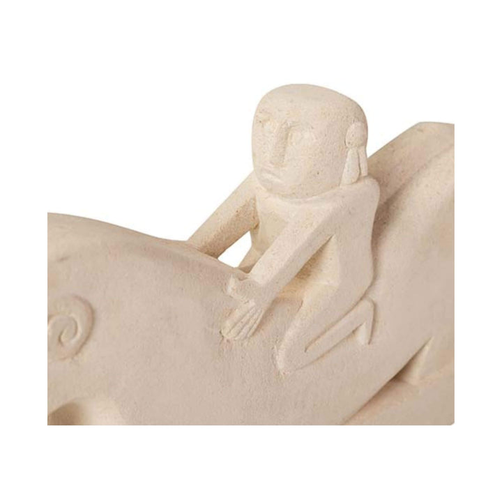 Rider figure carved in stone, close-up