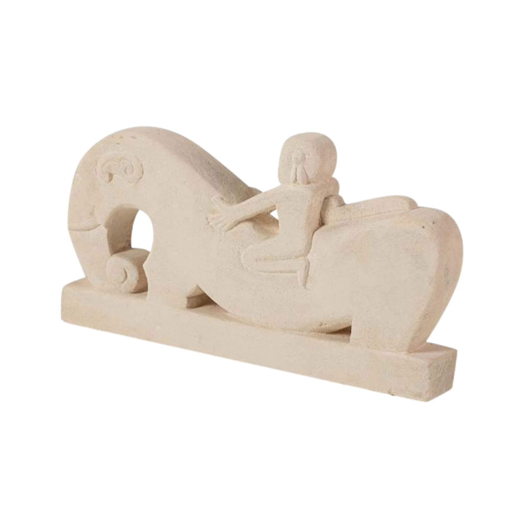 Stone rider sculpture angled view