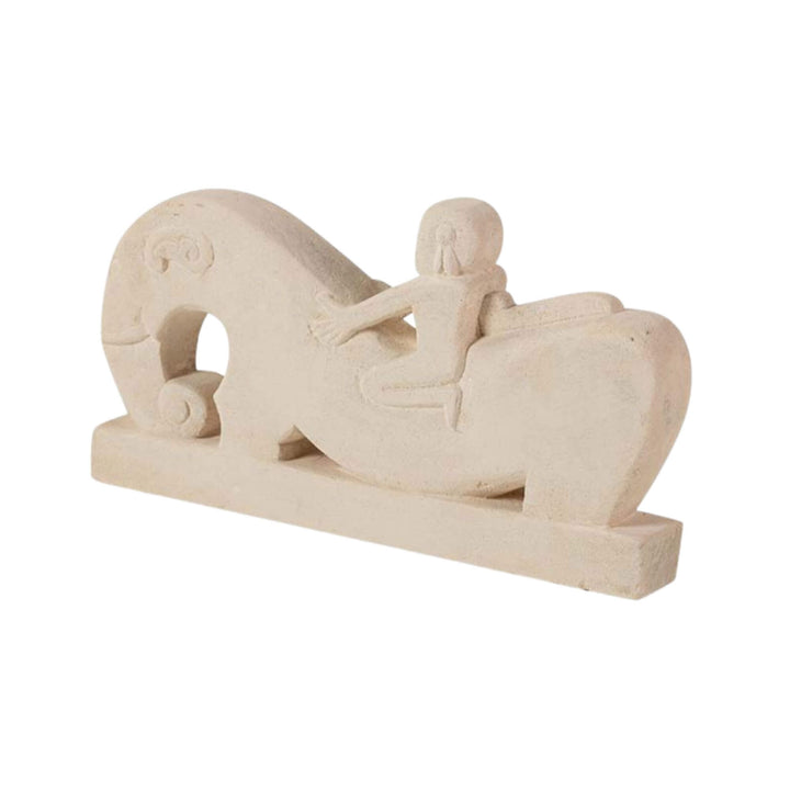 Stone rider sculpture angled view