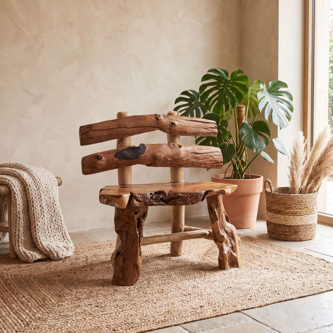 Auster reclaimed teak wood bench styled in a warm natural interior with plants and woven textures
