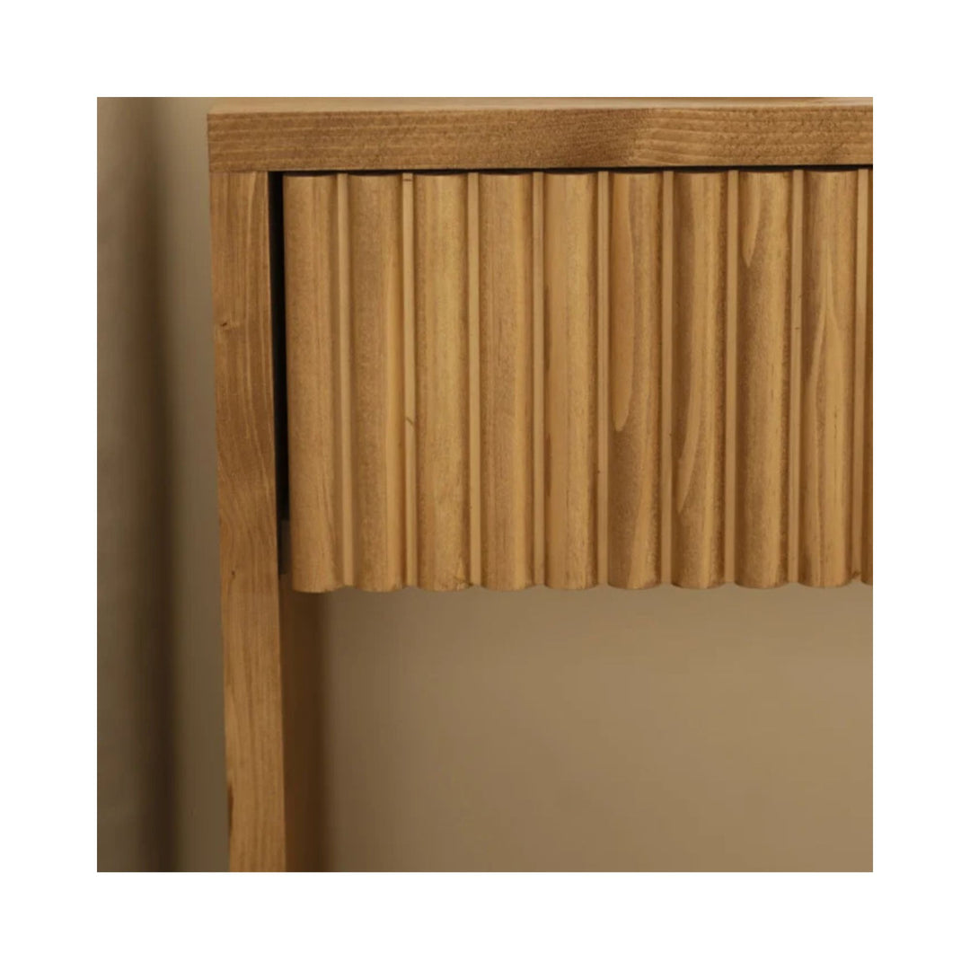 Close-up of fluted drawer detail on the Ayana oak bedside table.