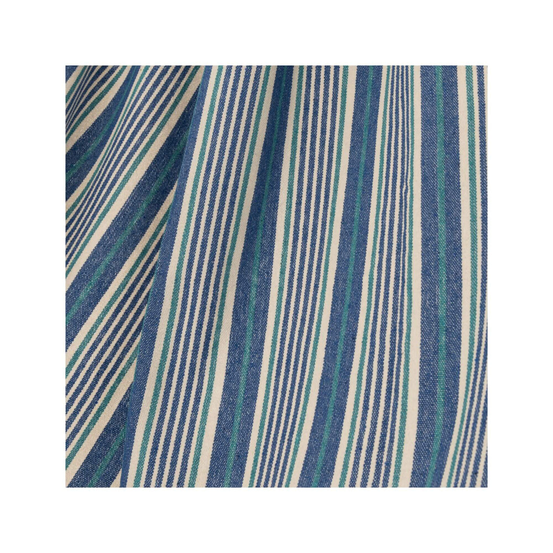 Close-up of blue and white striped hammock fabric.