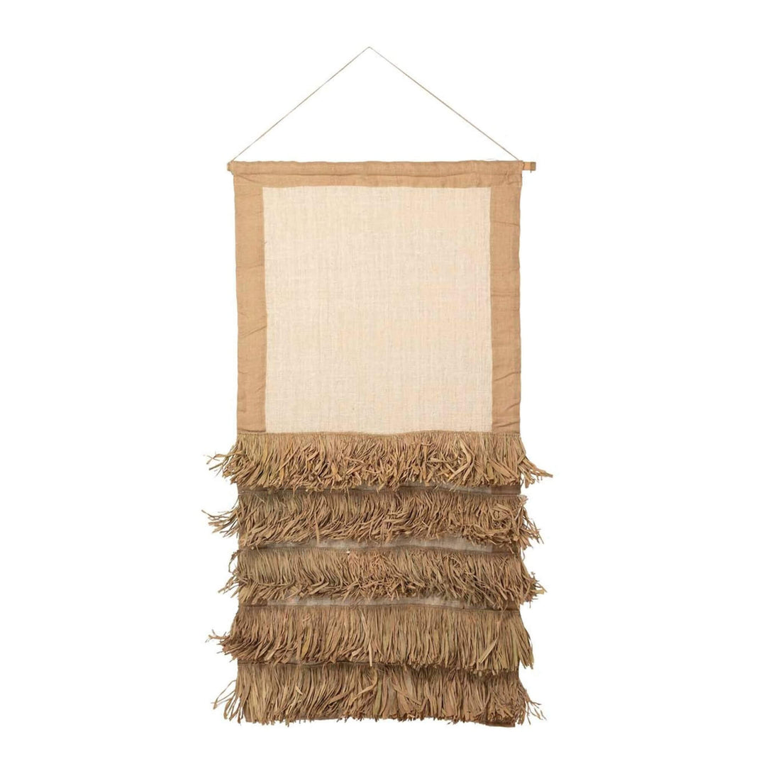 Natural fiber wall curtain with layered fringe and shell accents from the Badimo Collection.