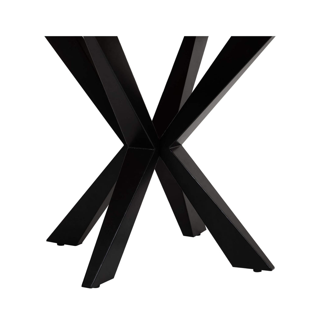 Detailed view of black metal cross-leg structure.