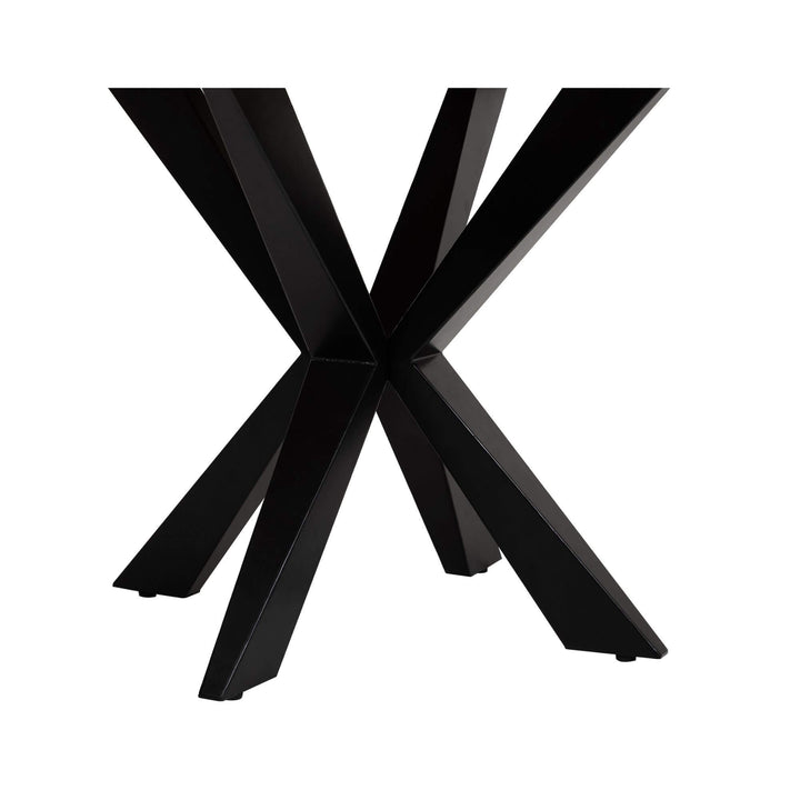 Detailed view of black metal cross-leg structure.