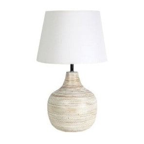 White-wash bamboo table lamp with fabric shade on a rounded base.