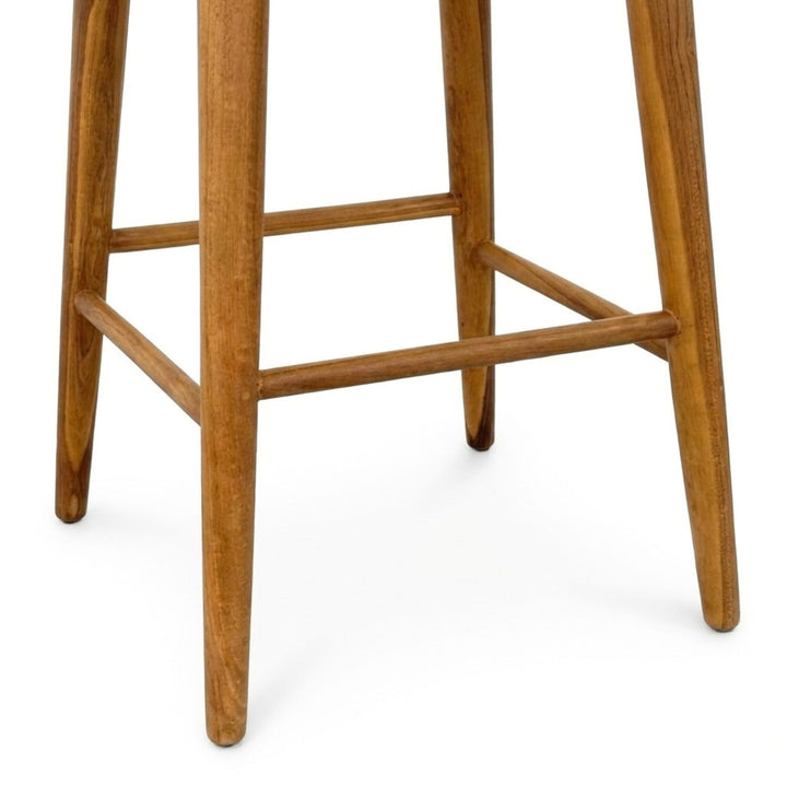Detail view of Banana Bar Stool legs and cross supports showing handcrafted construction.