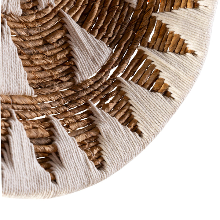 Close-up detail of the banana leaf and cotton weave highlighting texture and craftsmanship.