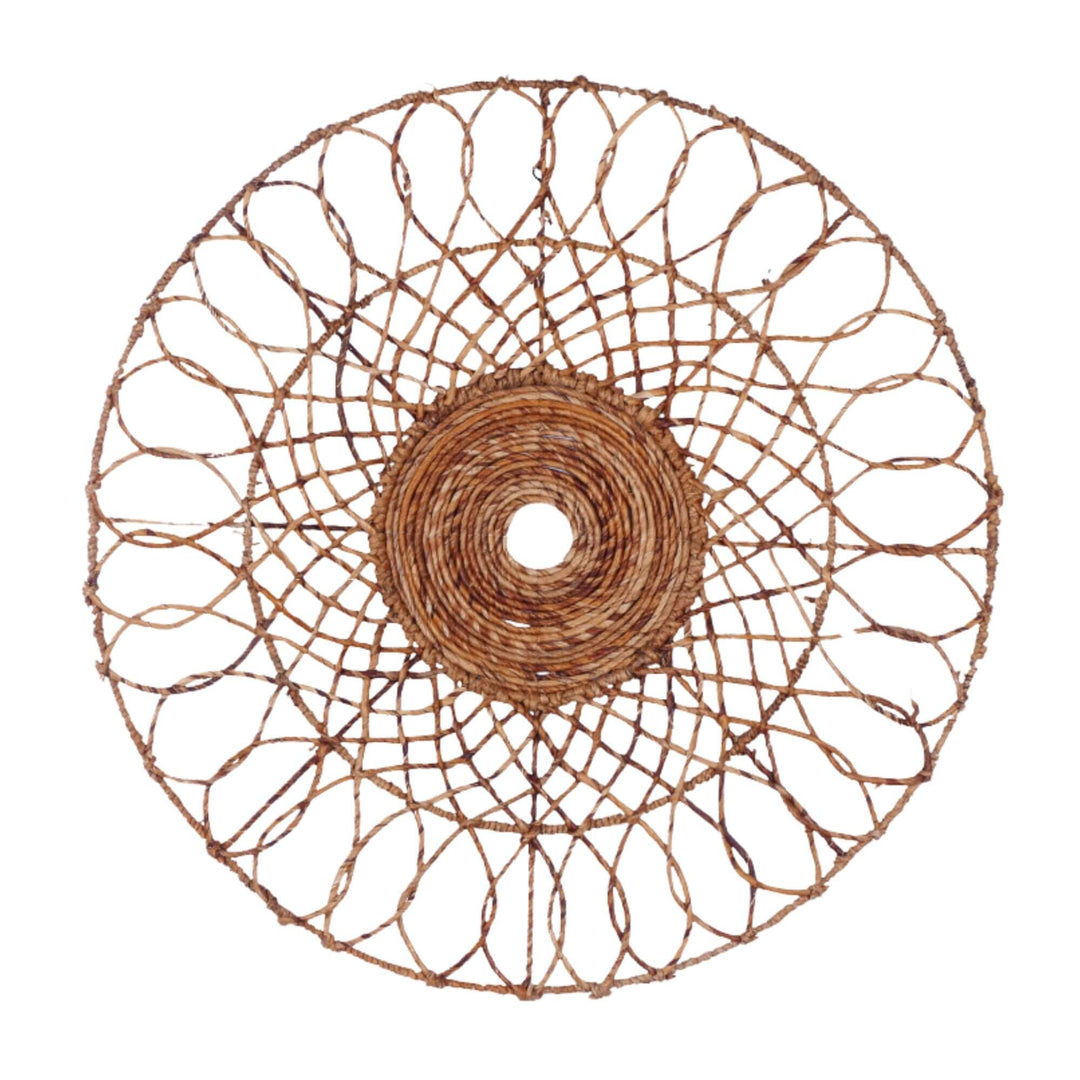 Open-weave boho wall decoration in natural tones crafted from banana fiber.

