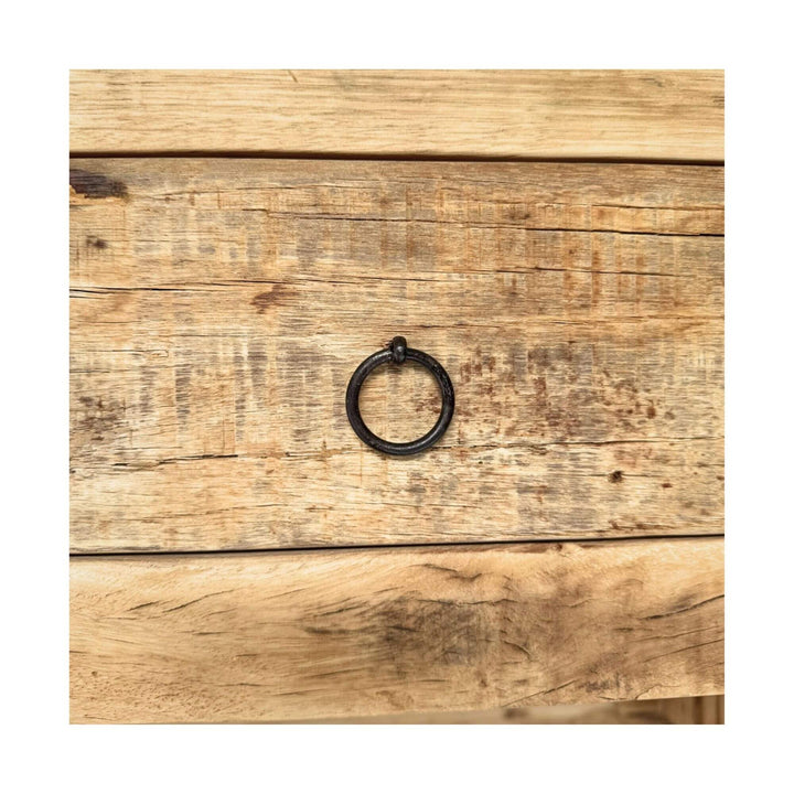 Close-up of sheesham wood drawer front with round metal ring pull on Bangka console.