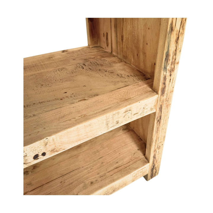 Close-up of lower shelves highlighting rustic grain of sheesham wood console.