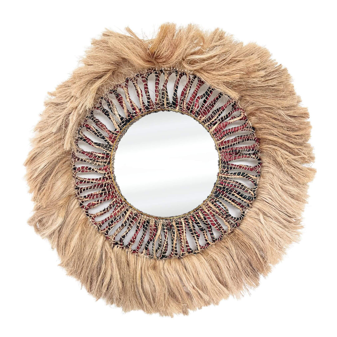 Round Banyu Mirror with a decorative frame featuring tassels and beadwork on a white background