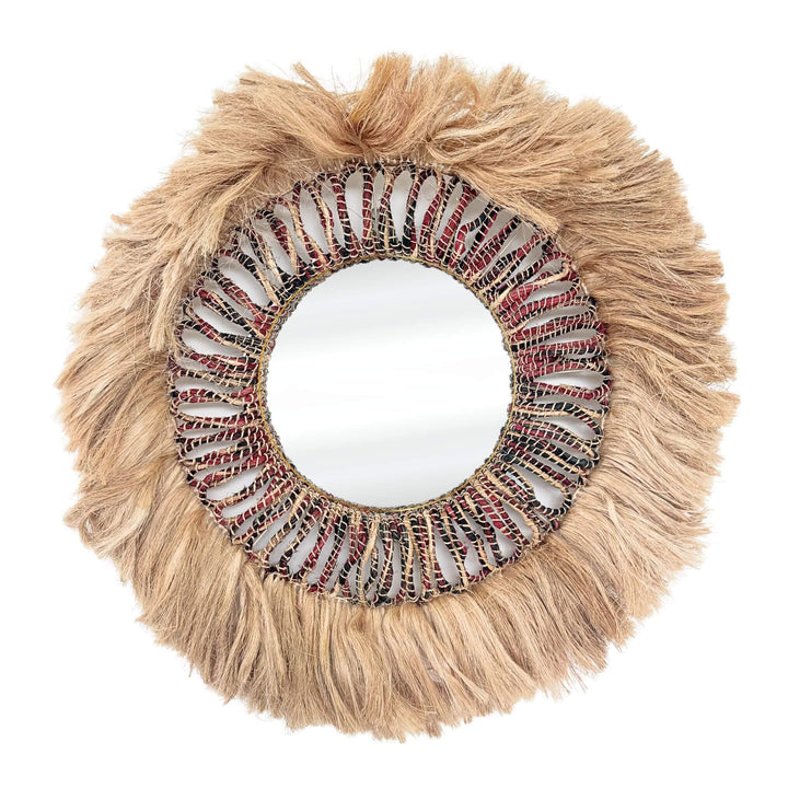 Round Banyu Mirror with a decorative frame featuring tassels and beadwork on a white background