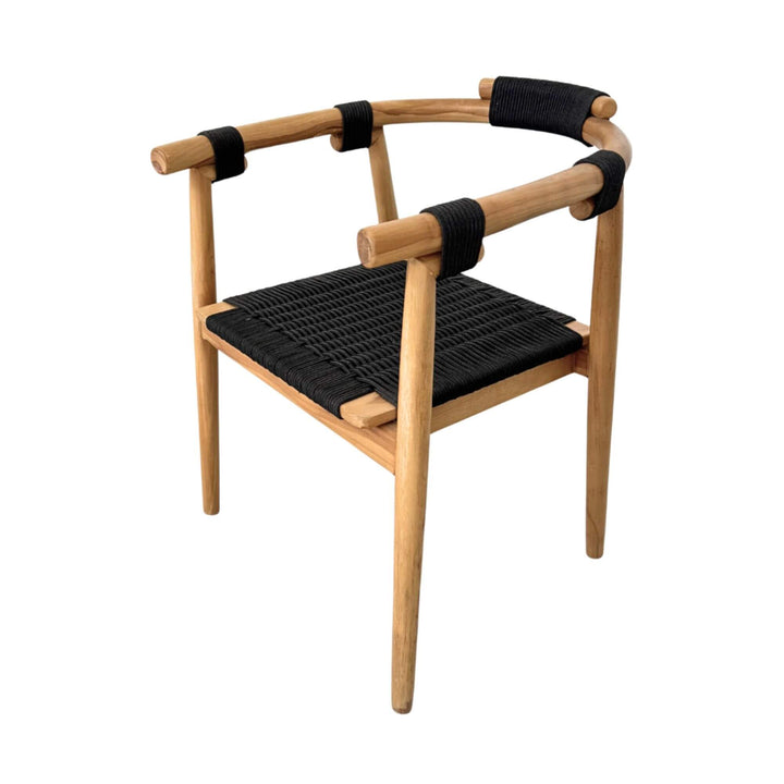 Baros Dining Chair in teak wood with black rope seat shown in three-quarter angle.