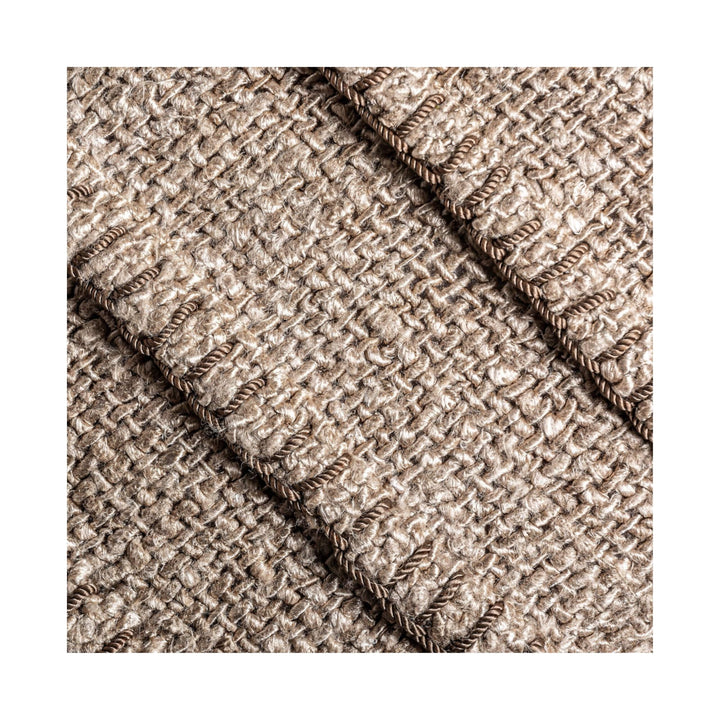 Detailed texture shot of Barro Cushion woven surface.