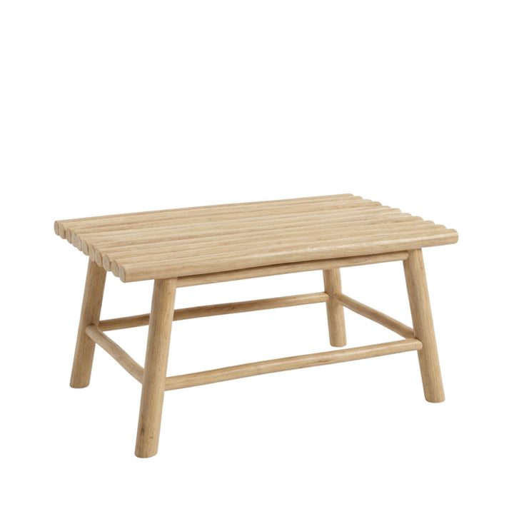 Front view of Batang coffee table showcasing its slatted teak branch top and sturdy frame.