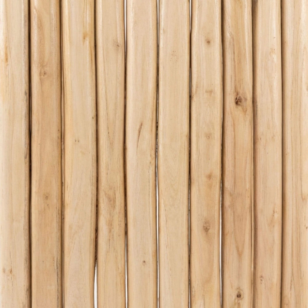 Top view detail of the Batang coffee table highlighting the linear teak branch surface.