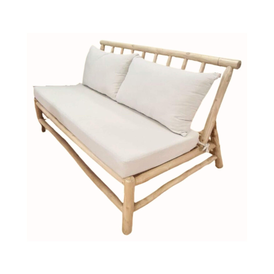 Batang Sofa Without Armrest in natural teak wood with white cushions shown at an angle.