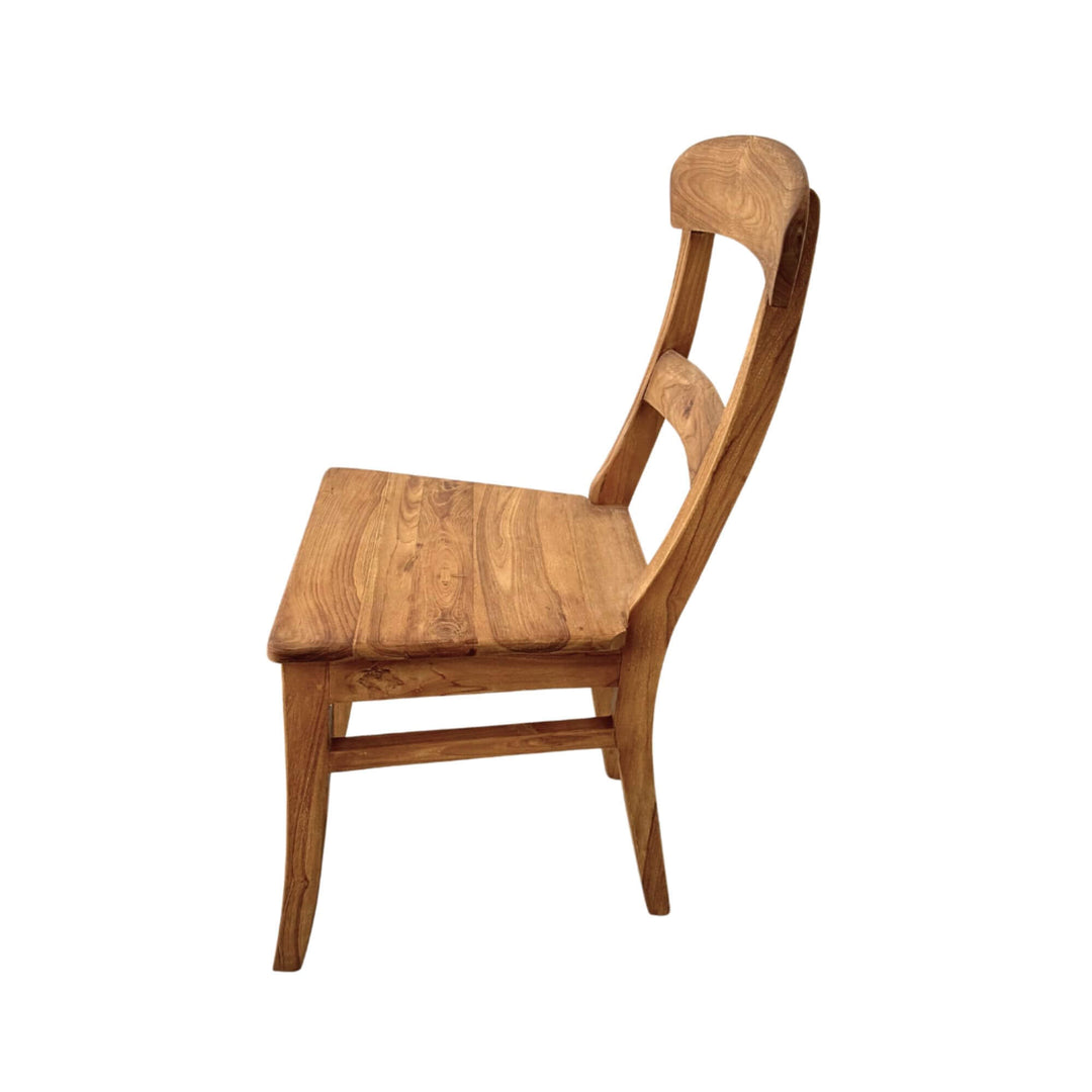 Side view of the Batauga Teak Round Dining Chair showing curved silhouette.