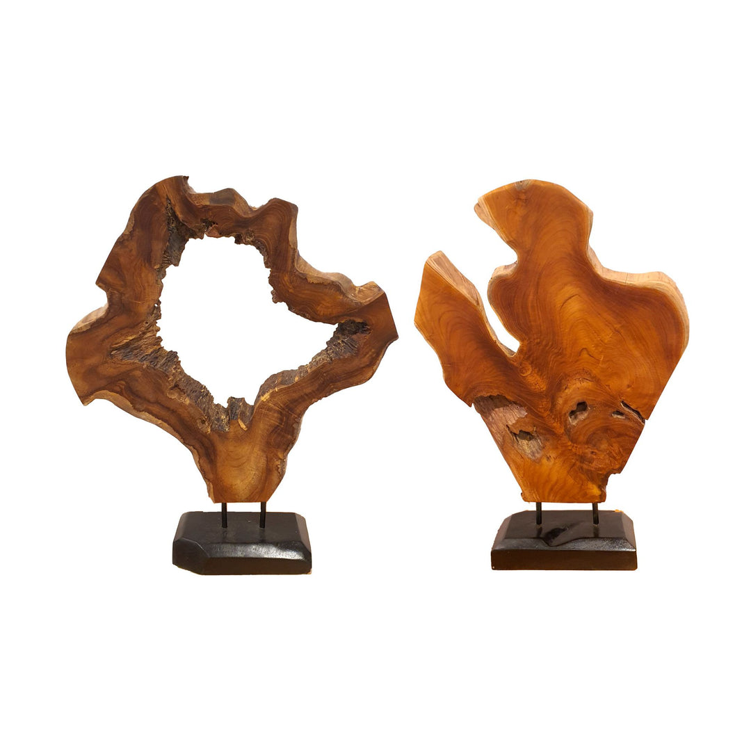 Teak figure stand on a black base showing natural grain and thickness.