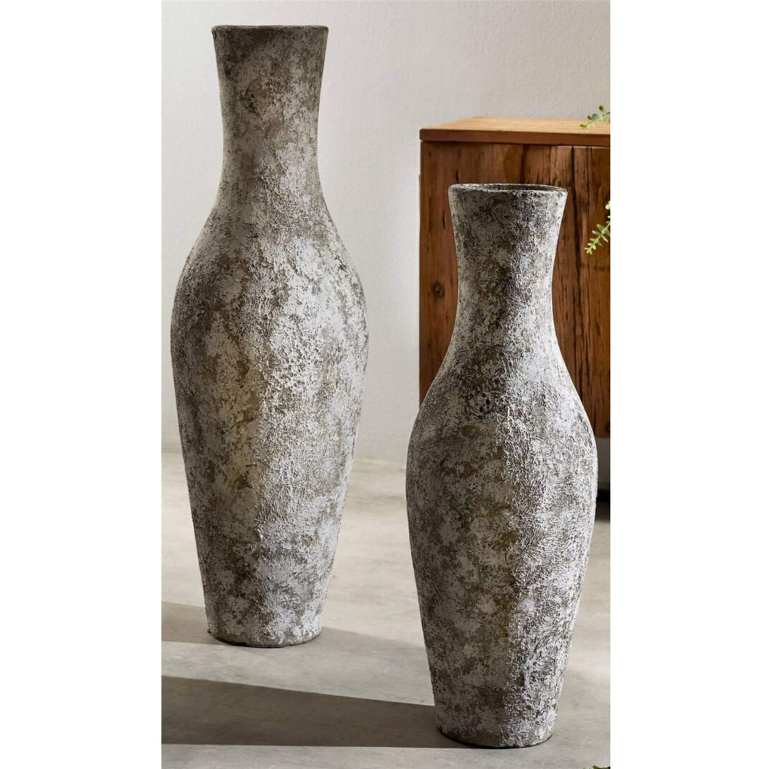 Bauxita Terracotta Pots in two sizes displayed in a modern interior setting.