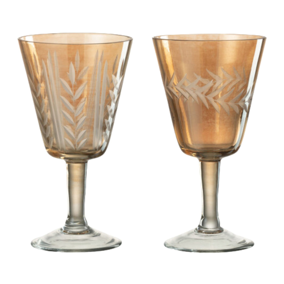 Pair of Bazaruto Glass Cup Beige pieces showcasing etched patterns and beige-toned glass.