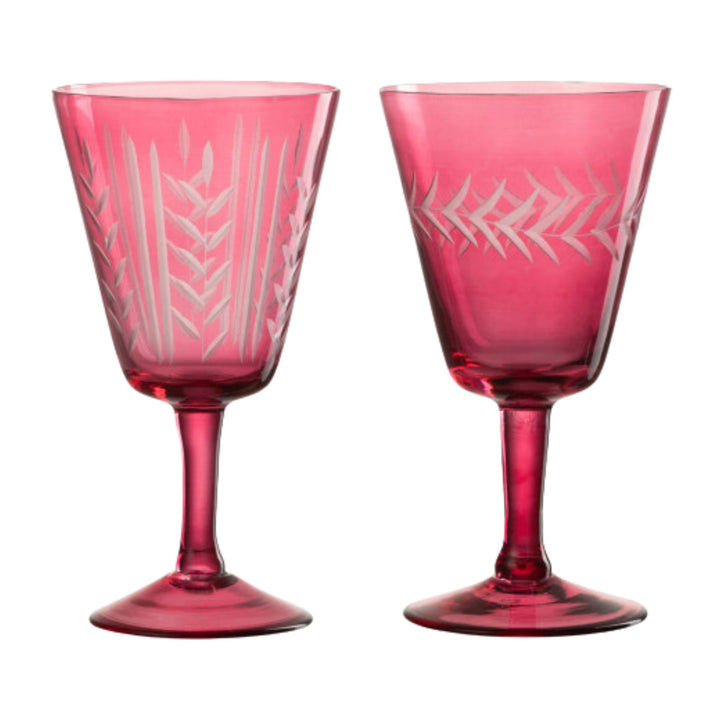 Pair of Bazaruto Glass Cup Pink pieces featuring etched patterns and tall stems.