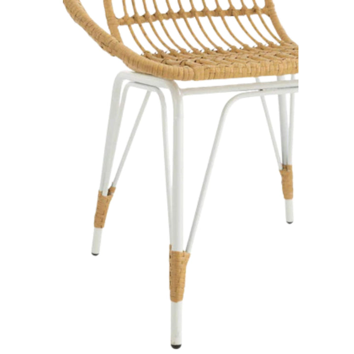 Close-up of Beach Chair white metal legs with wrapped synthetic rattan detail.