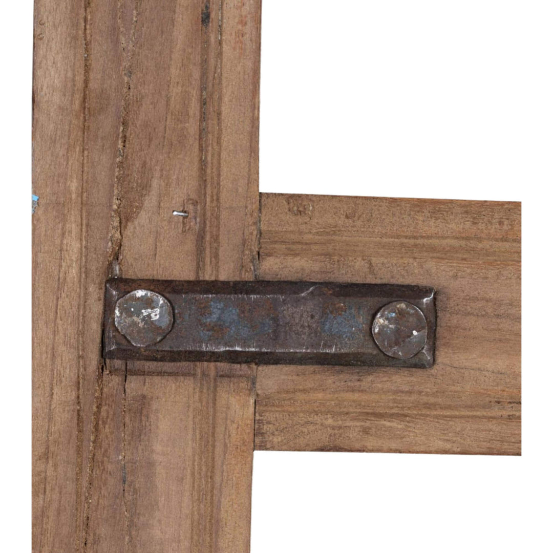 Close-up of the metal hardware on the Bentaneil Mirror frame crafted from reclaimed boat wood.