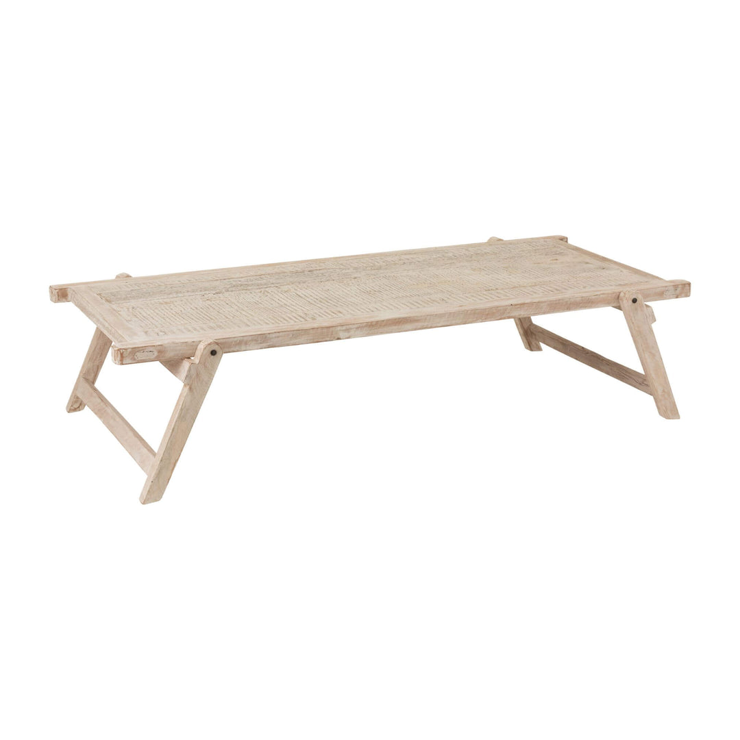 Angled side view of large rectangular wooden coffee table