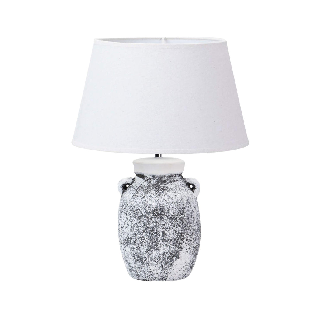Front view of the Bianca table lamp showing its speckled ceramic base and white textile shade.